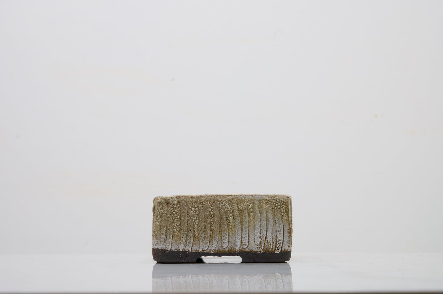 Carved in Black Clay -  Textured Cream Ceramic 10cm Vessel