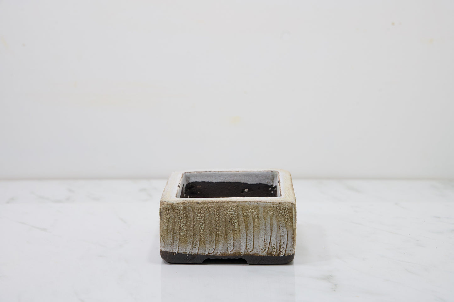 Carved in Black Clay -  Textured Cream Ceramic 10cm Vessel