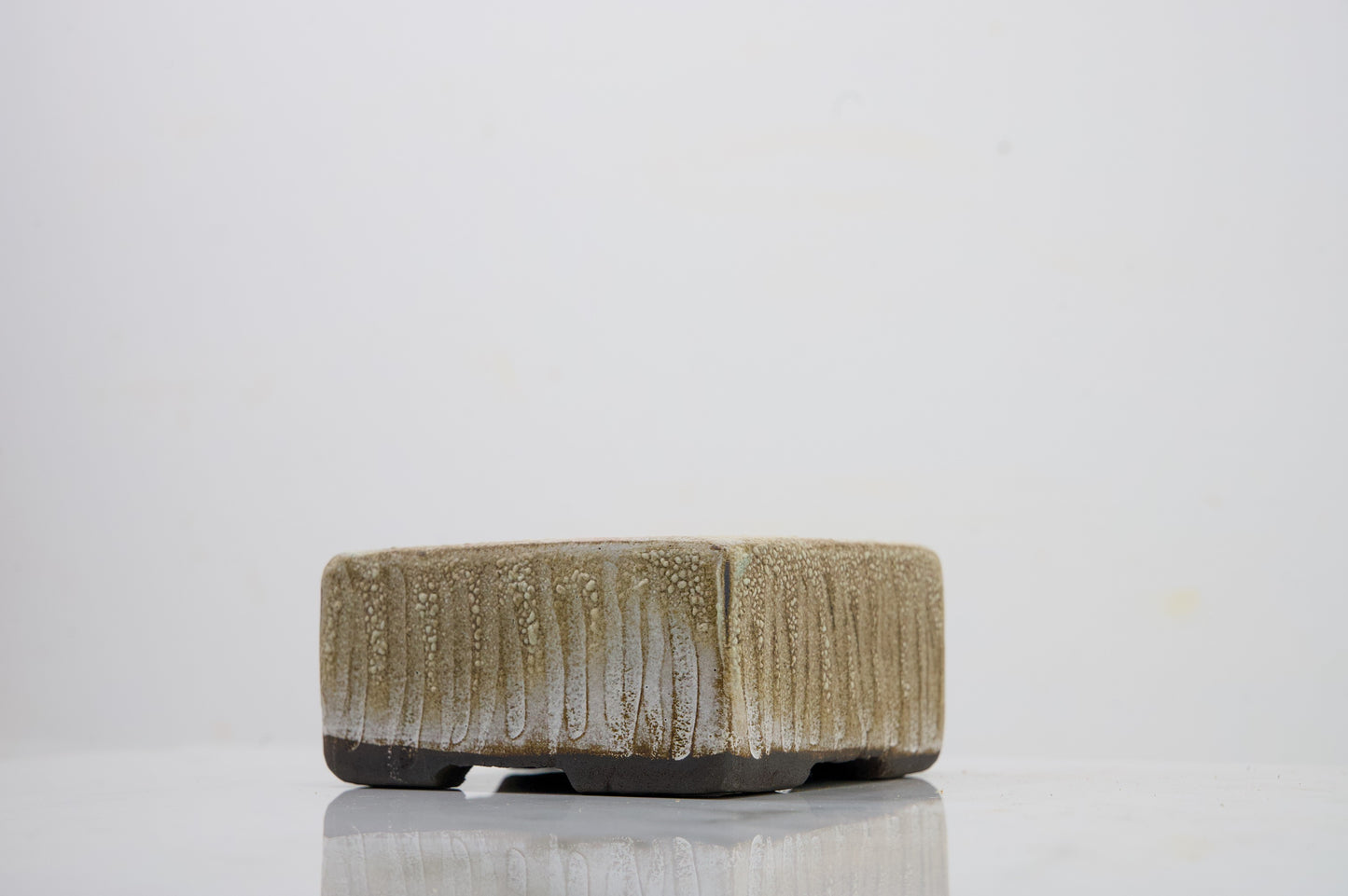 Carved in Black Clay -  Textured Cream Ceramic 10cm Vessel