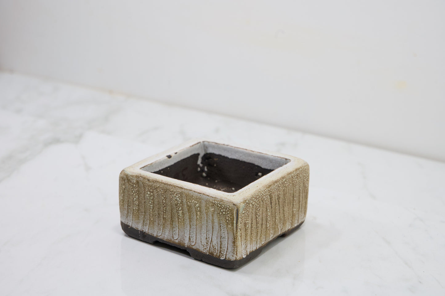 Carved in Black Clay -  Textured Cream Ceramic 10cm Vessel