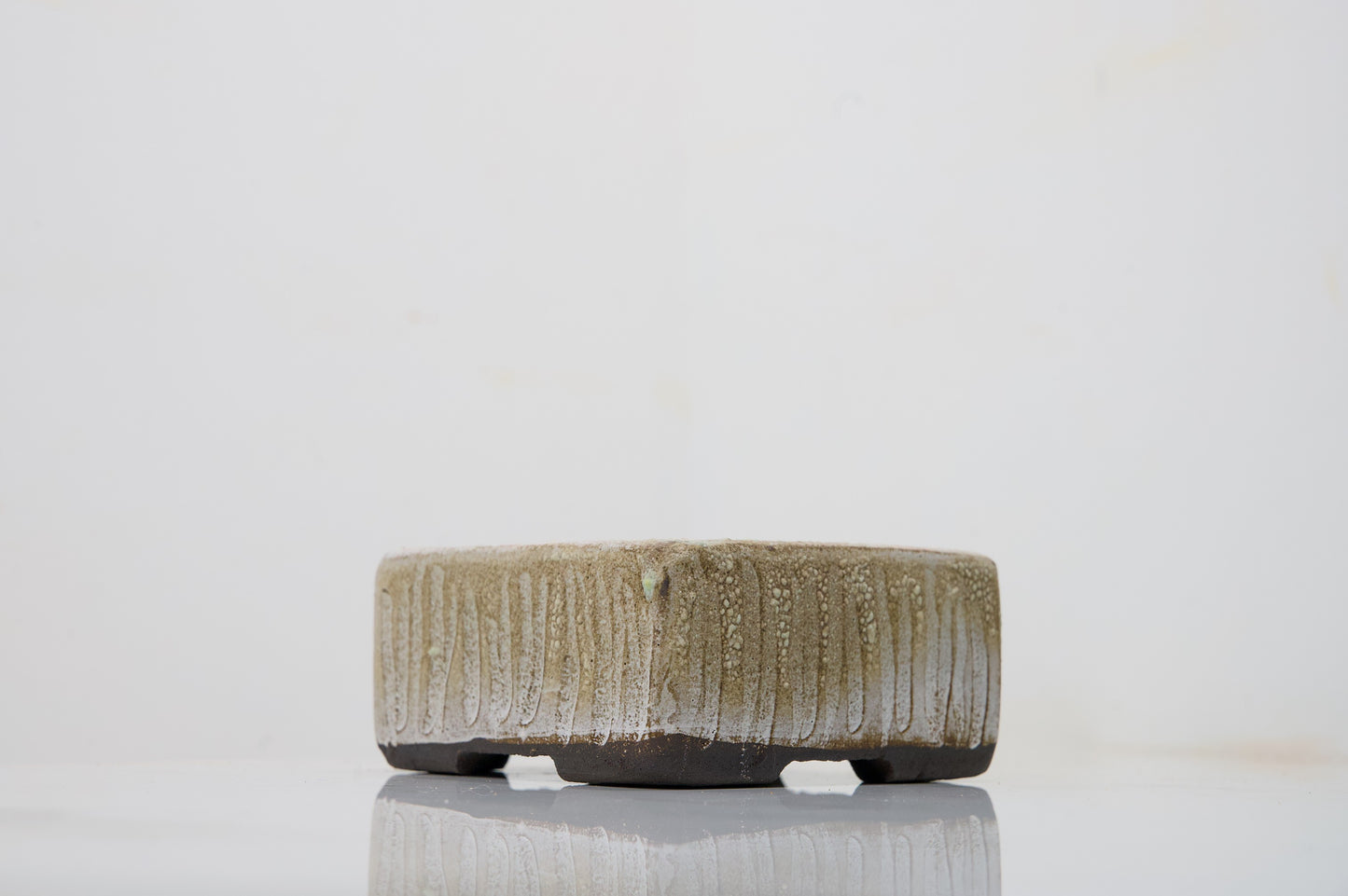 Carved in Black Clay -  Textured Cream Ceramic 10cm Vessel