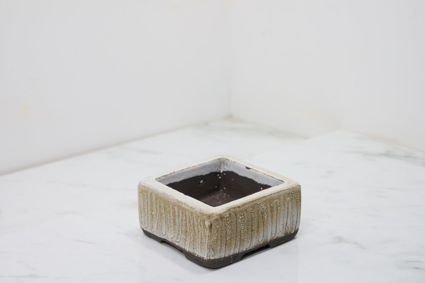 Carved in Black Clay -  Textured Cream Ceramic 10cm Vessel